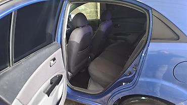 Kia: Kia Rio: 1.5 l | 2005 il — 14