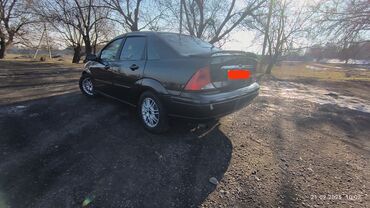 наклейка афто: Ford Focus: 2000 г., 2 л, Автомат, Газ, Седан