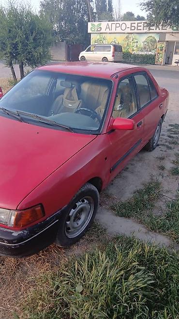 rox 01: Mazda 323: 1993 г., 1.6 л, Механика, Бензин, Седан — 2