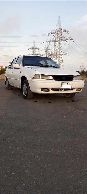 guzgu: Model: Daewoo Nexia, ağ sedan Xüsusiyyətlər: - Kuzov: 4 qapılı sedan — 5