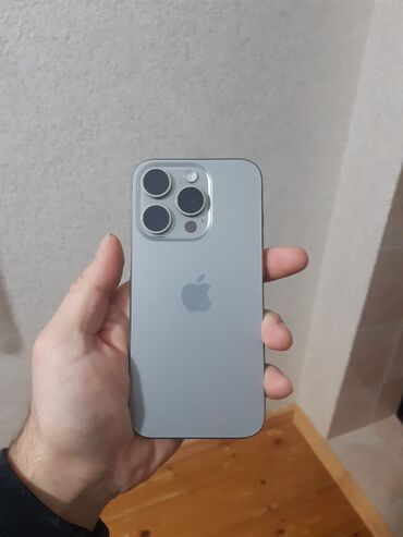 Apple iPhone: IPhone 15 Pro, 128 GB, Natural Titanium, Barmaq izi, Face ID, Simsiz şarj