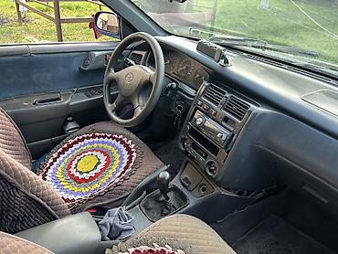 серв машина: Toyota Carina E: 1997 г., 1.8 л, Механика, Газ, Универсал — 4