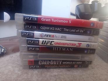 PS3 (Sony PlayStation 3): Игровая консоль Sony PlayStation 3 (модель Slim) с набором дисков — 4