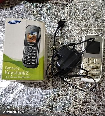 телефон fly fs502 cirrus 1: Samsung GT1200, цвет - Белый, Кнопочный — 1