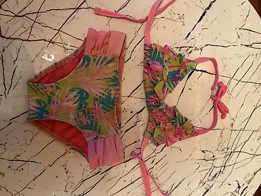uşaq paltarlar: Uşaq qız üçün 2 ədəd bikini dəsti 1) Çəhrayı bikini: - Üst: üçbucaq — 2