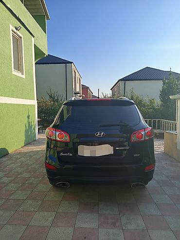 opel duman: Hyundai Santa Fe: 2 l | 2010 il Krossover — 10