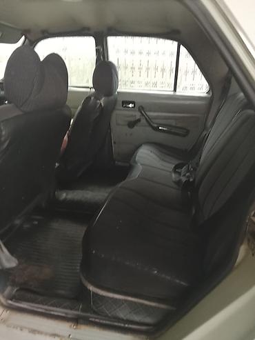 üstü açıq maşın: Model: GAZ Volga (24/3102 seriyası ehtimal olunur) Kuzov: sedan, ağ — 5