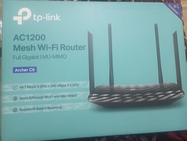 Modemlər və şəbəkə avadanlıqları: TP-Link AC1200 Archer C6 simsiz marşrutizatoru. Bu, 867 Mbps 5 GHz və
