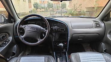 avto karavan: Kia Cerato: 1.8 l | 2002 il Sedan — 10