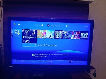 village: Məhsul: Sony PlayStation 4 Slim oyun konsolu Təsvir: - Model: PS4 — 3