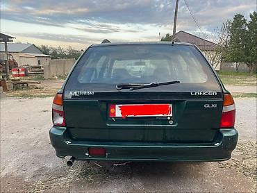 пш метр: Mitsubishi Lancer: 1999 г., 1.6 л, Кол менен иштөөчү, Бензин, Универсал — 2