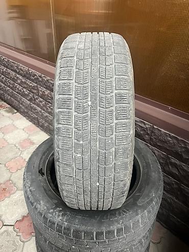 Шины: Комплект зимних шин 235/60 R18. На фото — 4 автомобильные шины — 2