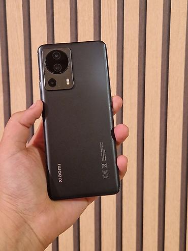Xiaomi 13 Lite, 256 GB, rəng - Qara, 
 Zəmanət, Barmaq izi, Simsiz şarj