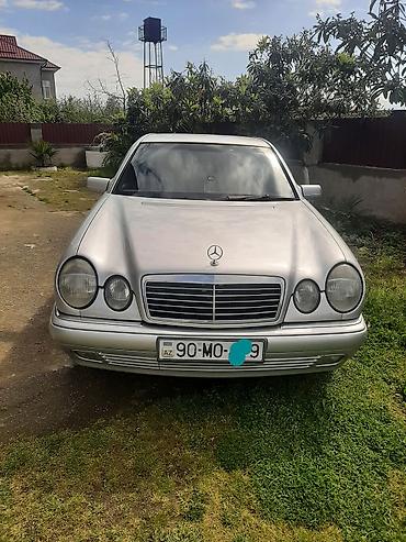 motor bmw: Mercedes-Benz E 230: 2.3 l | 1996 il Sedan — 1