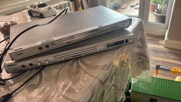 aile tv whatsapp: İki ədəd DVD player satılır. Hər ikisi gümüşü rəngdədir və müxtəlif