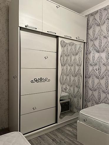 Ağ rəngdə sürgülü qapılı yataq otağı dolabı. - Dizayn: Minimalist lalafo.az -da Ağ rəngdə sürgülü qapılı yataq otağı dolabı. - Dizayn: Minimalist