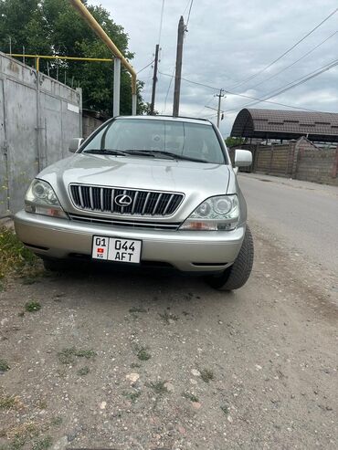 багаж на срв: Lexus RX 300 серебристого цвета. Автомобиль рейлинги для крепления
