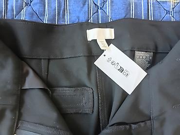 Pantalone: H&M Crne elegantne ženske pantalone sa širokom nogavicom. Model — 4