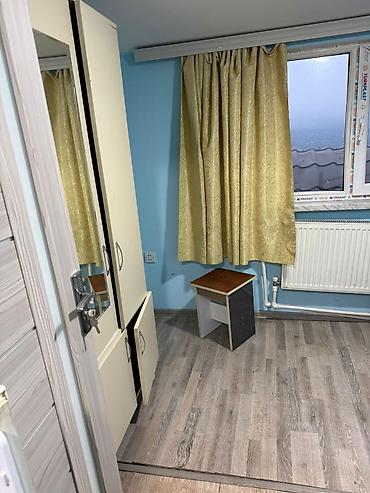 Mənzillər: 1 otaqlı mənzil (studiyaya yaxın plan) – mərkəzi istilik radiatorları — 2