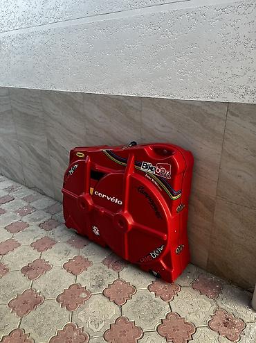 Чемоданы: Жёсткий чехол для перевозки велосипеда BikeBox Alan (красный) - — 1