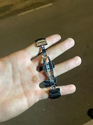 tap.az saatli: Tissot avtomatik qol saatı – qara metal bracelet və skelet mexanizmli — 2