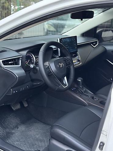 mers e210: Toyota Corolla: 2020 г., 1.8 л, Вариатор, Гибрид, Седан — 2