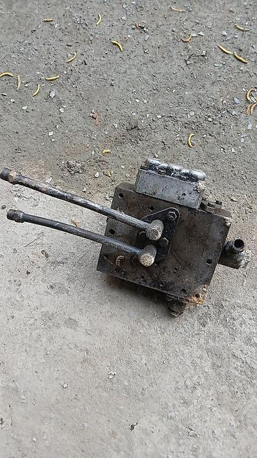t25 traktor: Hidravlik paylayıcı (valf bloku) - Çoxseqmentli mexaniki idarəetmə: 3 — 1