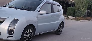 каракол катализатор: Компактный пятидверный городской автомобиль с необычным футуристичным — 3
