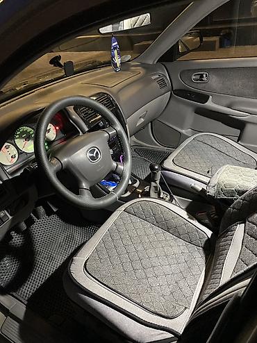 suzuki 200: Mazda Capella: 2000 г., 2 л, Механика, Газ, Хэтчбэк — 5