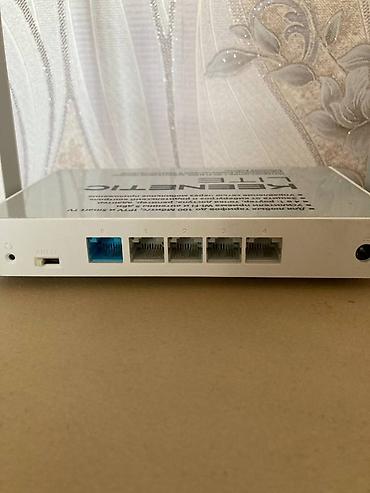 fire: Keenetic Lite (KN-1310) — Wi-Fi маршрутизатор с 4 режимами работы и — 2