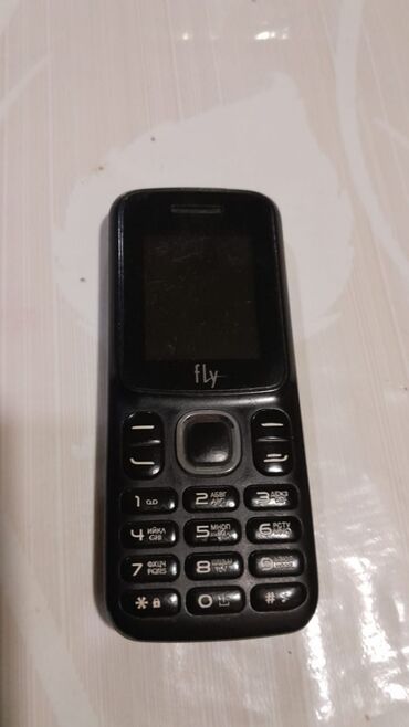 Fly FF180 sade telefon tekce adaptırı var