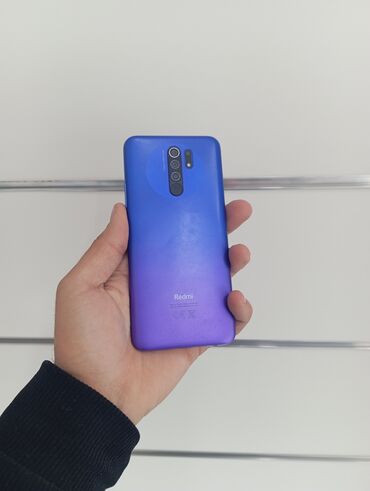 телефон fly mc170 ds: Xiaomi Redmi 9, 64 ГБ, цвет - Оранжевый, 
 Кнопочный, Отпечаток пальца, Две SIM карты