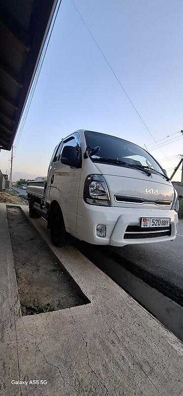 mitsubishi toppo: Kia Bongo III (K2500/K2700) бортовой малотоннажный грузовик, левый — 2