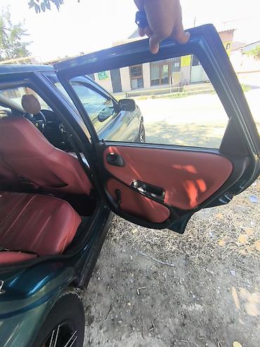 Opel: Opel Astra: 1.6 l | 1997 il Sedan — 5