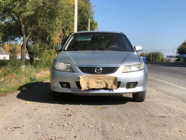 Mazda: Mazda 323: 2001 г., 1.6 л, Механика, Бензин, Хэтчбэк