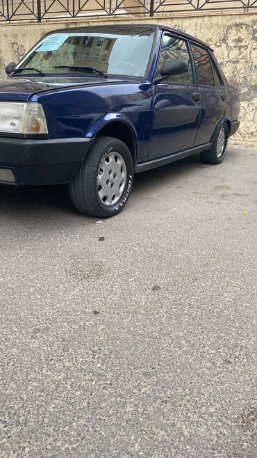 Tofas: Model: Tofas Şahin (sedan) Kuzov: 4 qapı, mavi rəng Yanacaq: Benzin -da lalafo.az — 5 Tofas: Model: Tofas Şahin (sedan) Kuzov: 4 qapı, mavi rəng Yanacaq: Benzin — 5