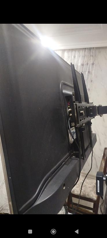 кронштейн для тв: Döndərilə bilən divar asqısı ilə LCD/LED televizor - Müxtəlif ölçülü — 2