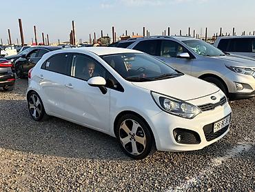 Kia: Kia Rio: 1.4 л | 2012 г. Хэтчбэк — 7