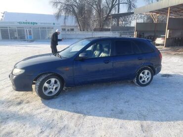 Mazda: Mazda 323: 2001 г., 1.6 л, Механика, Бензин, Лимузин