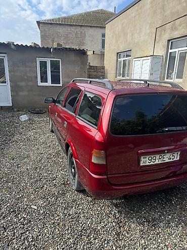 opel astra benzin: Opel Astra Caravan (Universal), qırmızı gövdə yalnız kredetlə — 8