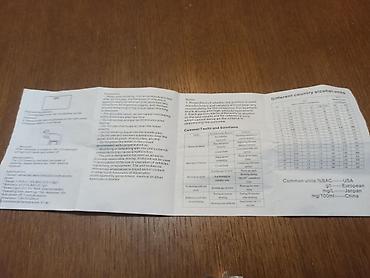 3 pa 1: Privezak alko-tester. Napaja se običnim baterijama od 1,5V. Uz njega — 9