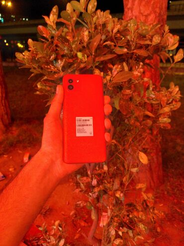 telefon vinilleri: Samsung Galaxy A03, 64 GB, rəng - Qırmızı, Düyməli, Face ID