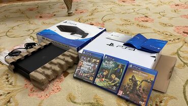 PS4 (Sony Playstation 4): Playstation 4 1 tb kutuda yeni ancag 1 hefte islenib butun sunurlari