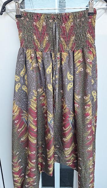 osiris patike: Begi pantalone – model sa širokim, spuštenim krojem i elastičnim — 2