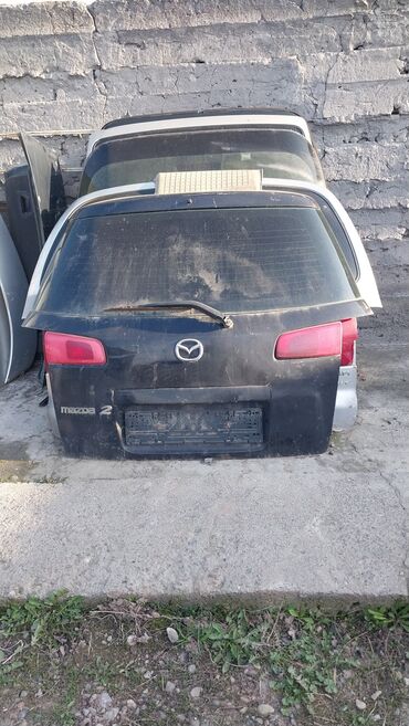 багажник жугили: Багажник капкагы Mazda 2000 г., Колдонулган, Оригинал
