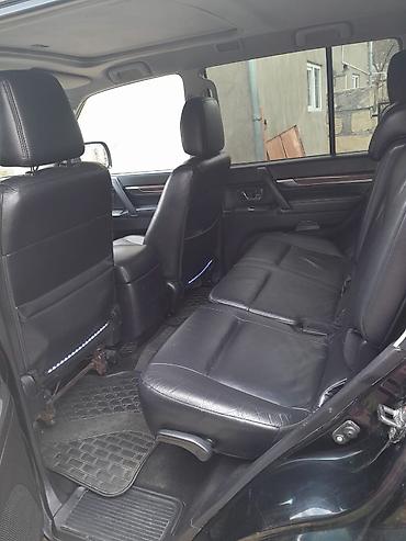 Mitsubishi: Mitsubishi Pajero (GLS) SUV - Kuzov: qara rəng, 5 qapı, yan — 11