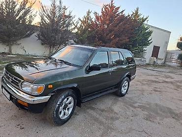 mini canta: Nissan Pathfinder: 3.3 l | 1999 il Ofrouder/SUV — 4