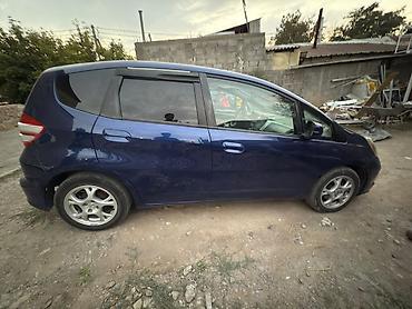 byd e2 2025: Honda Fit: 2010 г., Бензин, Хэтчбэк — 3