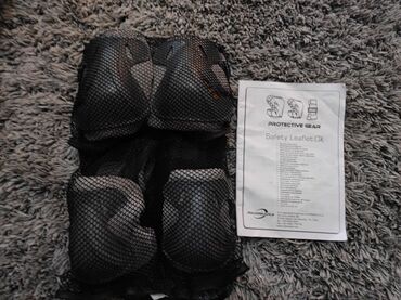 велосипедные шлемы: Комплект защиты Rollerblade, включающий в себя наколенники