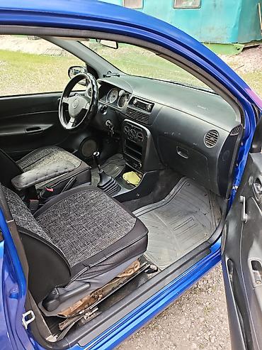 1: Daihatsu Cuore: 2003 г., 1 л, Механика, Бензин, Хэтчбэк — 4